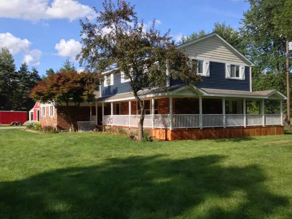 Wrap-Around Roofed Deck Construction By Spoiled Rotten Homes