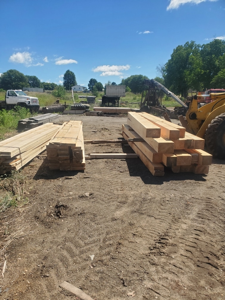 Stacks Of Timber Posts And Beams Ready For Development